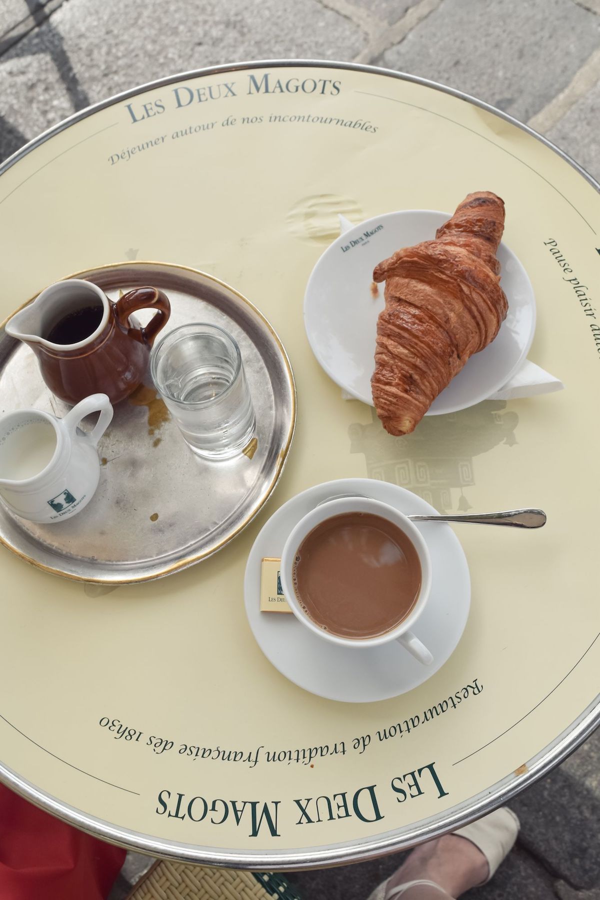 Coffee and croissant at Les Deux Magots, Paris