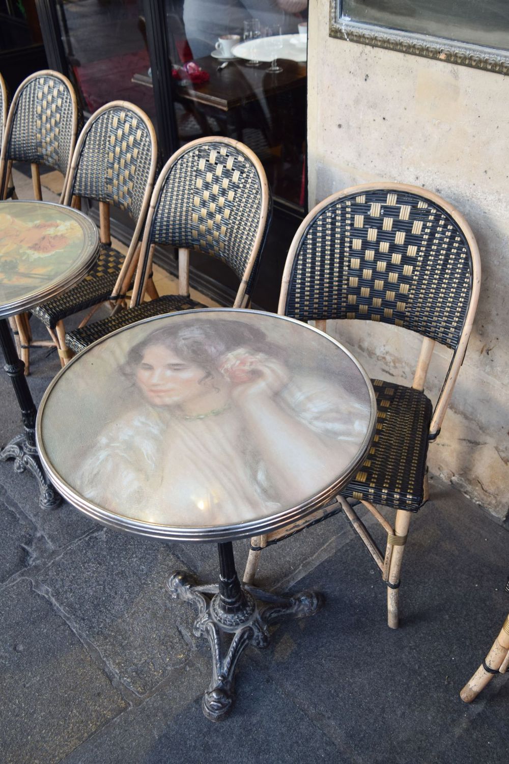 Vintage bistro table on Rue De Rivoli, Paris, France