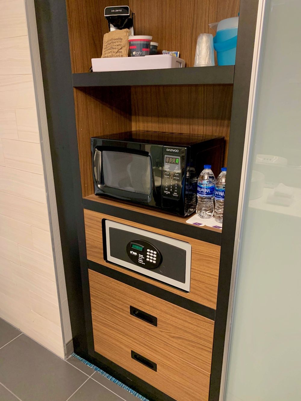 Microwave, Two Free Water Bottles, Safe, and Drawers at the Corpus Christi Aloft Hotel