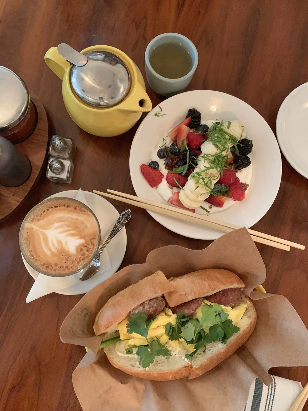 Yogurt and Sausage & Egg Sandwich for breakfast at Elizabeth Street Cafe, Austin