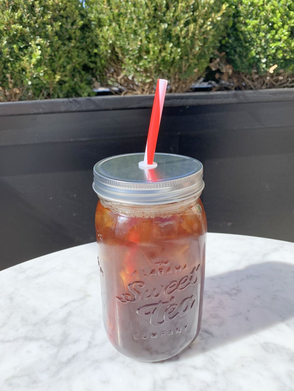 Alabama Sweet Tea Company tea served in a large glass mason jar at Magnolia