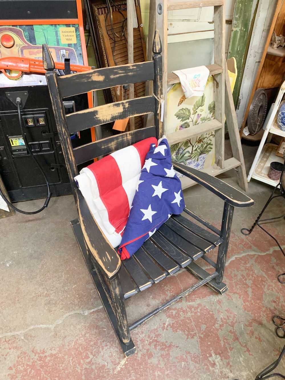 American flag on an antique rocking chair - Waco Guide