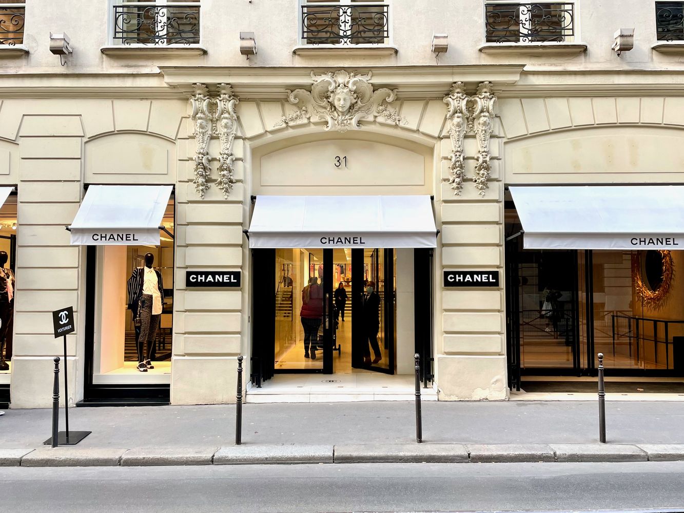 View of French luxury fashion house Louis Vuitton. Flagship store opened in  heart of Place Vendome 